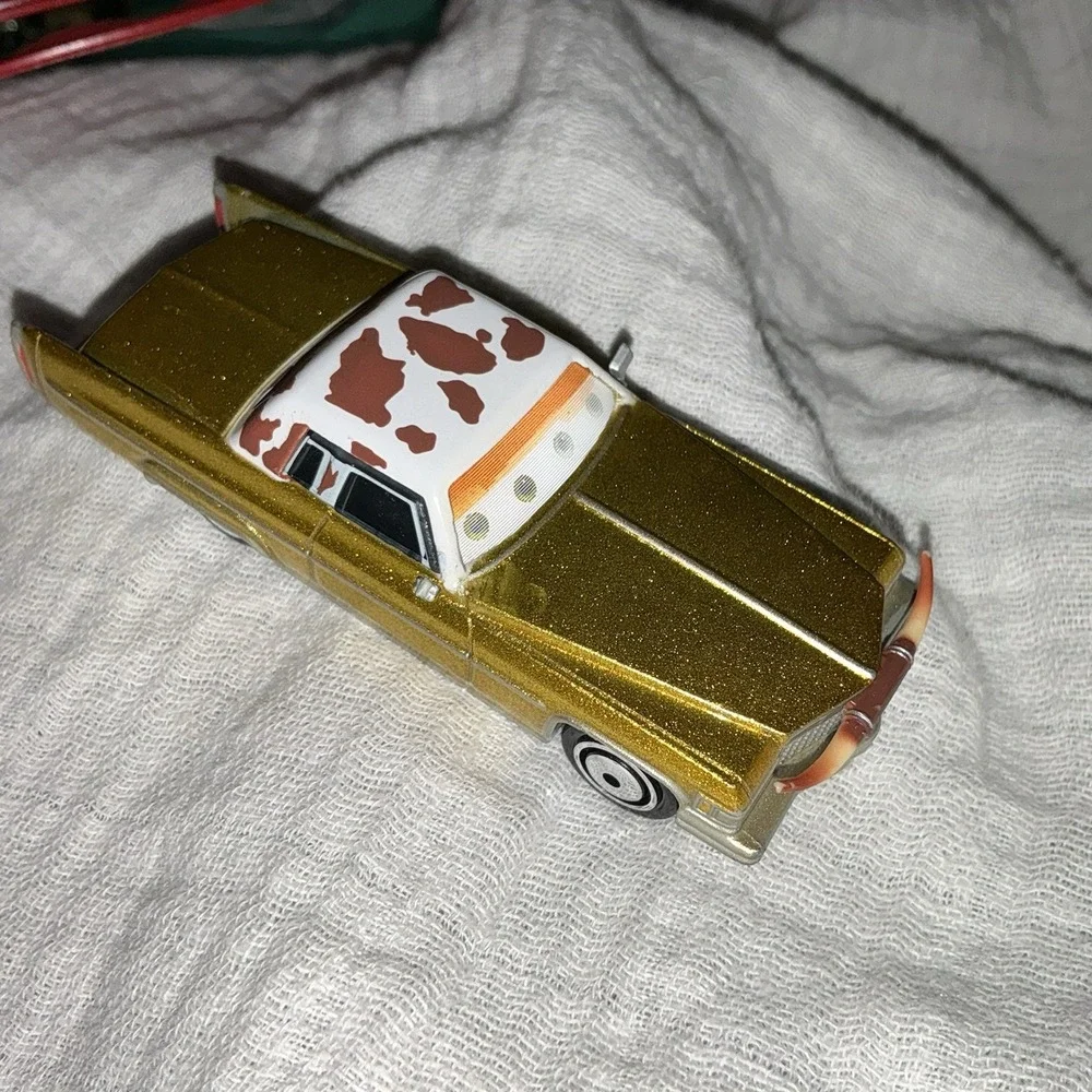 DISNEY PIXAR CARS TEX DINOCO Cow Print Horns Yellow